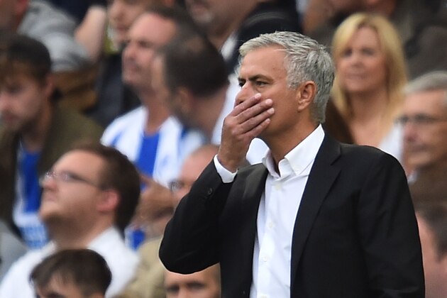 TOPSHOT - Manchester United's Portuguese manager Jose Mourinho gestures from the touchline during the English Premier League football match between Brighton and Hove Albion and Manchester United at the American Express Community Stadium in Brighton, southern England on August 19, 2018. (Photo by Glyn KIRK / AFP) / RESTRICTED TO EDITORIAL USE. No use with unauthorized audio, video, data, fixture lists, club/league logos or 'live' services. Online in-match use limited to 120 images. An additional 40 images may be used in extra time. No video emulation. Social media in-match use limited to 120 images. An additional 40 images may be used in extra time. No use in betting publications, games or single club/league/player publications. /         (Photo credit should read GLYN KIRK/AFP/Getty Images)