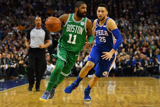 LONDON, ENGLAND - JANUARY 11:  Kyrie Irving #11 of the Boston Celtics holds off Ben Simmons #25 of the Philadelphia 76ers during the NBA game between Boston Celtics and Philadelphia 76ers at The O2 Arena on January 11, 2018 in London, England. (Photo by Dan Mullan/Getty Images)