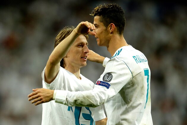MADRID, SPAIN - MAY 1: (L-R) Luka Modric of Real Madrid, Cristiano Ronaldo of Real Madrid celebrates the victory  during the UEFA Champions League  match between Real Madrid v Bayern Munchen at the Santiago Bernabeu on May 1, 2018 in Madrid Spain (Photo by Eric Verhoeven/Soccrates/Getty Images)