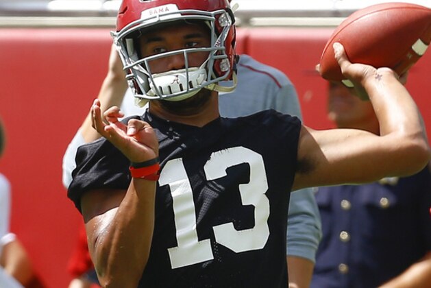 Alabama quarterback Tua Tagovailoa (13) throws a pass during a NCAA college football practice, Saturday, Aug. 4, 2018, in Tuscaloosa, Ala. (AP Photo/Butch Dill)