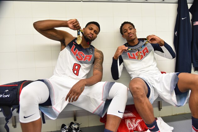 MADRID, SPAIN - SEPTEMBER 14: Rudy Gay #8 and DeMar DeRozan #9 of the USA Men's National Team poses for a photo with the gold medal in the locker room after defeating the Serbia National Team during the 2014 FIBA World Cup Finals at Palacio de Deportes on September 14, 2014 in Madrid, Spain.  NOTE TO USER: User expressly acknowledges and agrees that, by downloading and/or using this Photograph, user is consenting to the terms and conditions of the Getty Images License Agreement. Mandatory Copyright Notice: Copyright 2014 NBAE (Photo by Jesse D. Garrabrant/NBAE via Getty Images)
