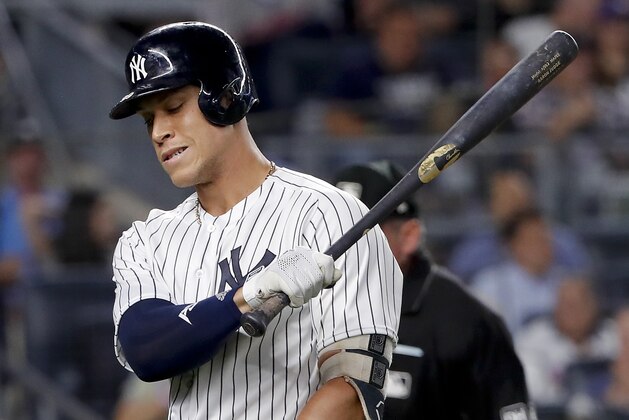 New York Yankees designated hitter Aaron Judge reacts after lining out to New York Mets first baseman Wilmer Flores to end the sixth inning of a baseball game Friday, July 20, 2018, in New York. (AP Photo/Julie Jacobson)