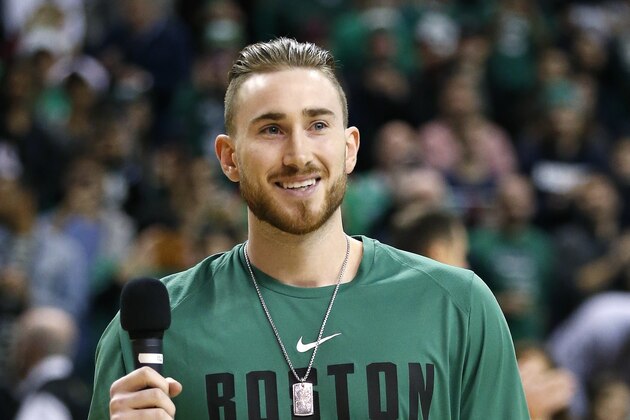 Boston Celtics Gordon Hayward addresses the crowd before an NBA basketball game against the Washington Wizards in Boston, Monday, Dec. 25, 2017. (AP Photo/Michael Dwyer)