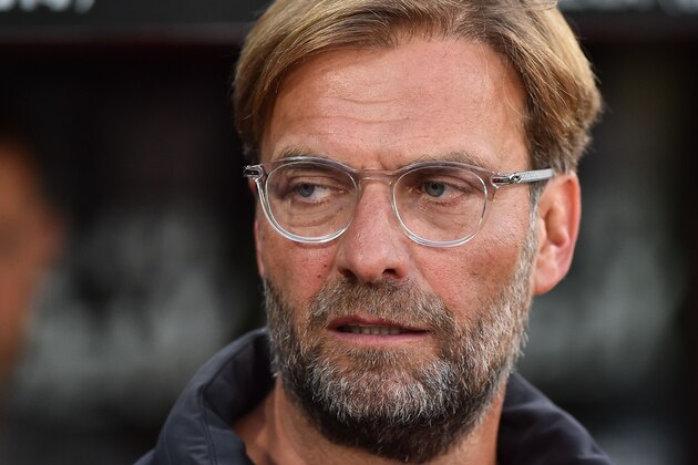 Liverpool's German manager Jurgen Klopp is seen before kick off of the English Premier League football match between Crystal Palace and Liverpool at Selhurst Park in south London on August 20, 2018. (Photo by Glyn KIRK / AFP) / RESTRICTED TO EDITORIAL USE. No use with unauthorized audio, video, data, fixture lists, club/league logos or 'live' services. Online in-match use limited to 120 images. An additional 40 images may be used in extra time. No video emulation. Social media in-match use limited to 120 images. An additional 40 images may be used in extra time. No use in betting publications, games or single club/league/player publications. /         (Photo credit should read GLYN KIRK/AFP/Getty Images)