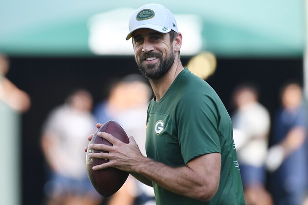 GREEN BAY, WI - AUGUST 09:  Aaron Rodgers #12 of the Green Bay Packers participates in warmups prior to a preseason game against the Tennessee Titans at Lambeau Field on August 9, 2018 in Green Bay, Wisconsin.  The Packers defeated the Titans 31-17.  (Photo by Stacy Revere/Getty Images)