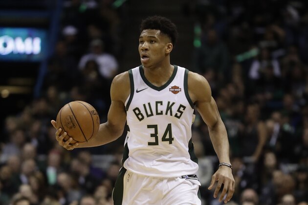 Milwaukee Bucks' Giannis Antetokounmpo dribbles during the first half of Game 3 of an NBA basketball first-round playoff series against the Boston Celtics Friday, April 20, 2018, in Milwaukee. (AP Photo/Morry Gash)