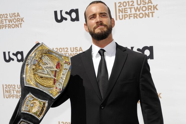 WWE wrestler CM Punk attends the USA network upfront presentation at Alice Tully Hall, Thursday, May 17, 2012 in New York. (AP Photo/Evan Agostini)