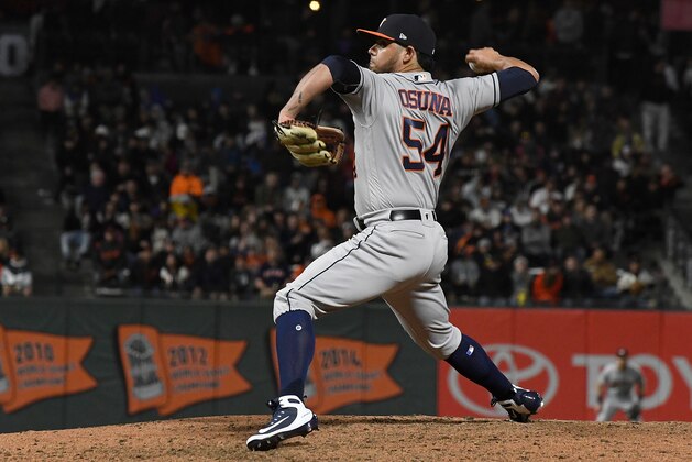 SAN FRANCISCO, CA - AUGUST 06:  Roberto Osuna #54 of the Houston Astros pitches against the San Francisco Giants in the bottom of the eighth inning at AT&T Park on August 6, 2018 in San Francisco, California.  (Photo by Thearon W. Henderson/Getty Images)