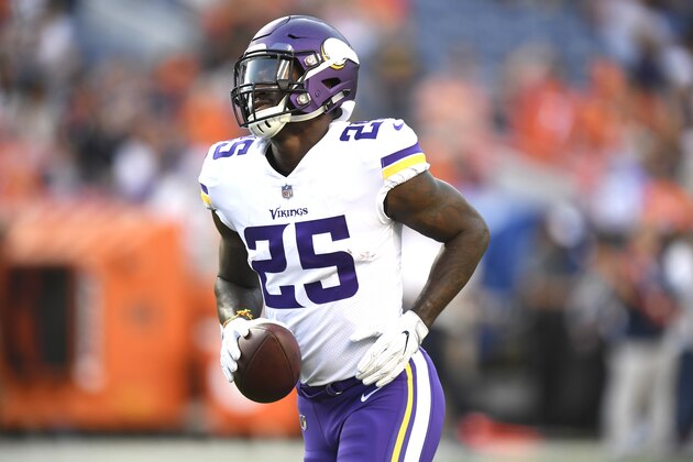 Minnesota Vikings running back Latavius Murray warms up before an NFL football game against the Denver Broncos Saturday, Aug. 11, 2018, in Denver. (AP Photo/Mark Reis)