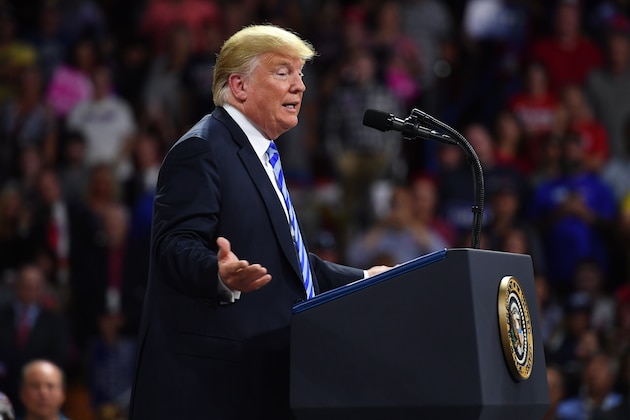 US President Donald Trump speaks during a political rally at Charleston Civic Center in Charleston, West Virginia on August 21, 2018. - Trump's administration announced a plan on August 21 to weaken regulations on US coal plants, giving a boost to an industry that former leader Barack Obama had hoped to wind down in order to cut harmful emissions that drive global warming. (Photo by MANDEL NGAN / AFP)        (Photo credit should read MANDEL NGAN/AFP/Getty Images)