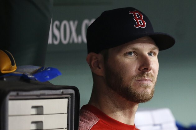 Boston Red Sox's Chris Sale sits in the dugout during the seventh inning of a baseball game against the Tampa Bay Rays in Boston, Saturday, Aug. 18, 2018. (AP Photo/Michael Dwyer)