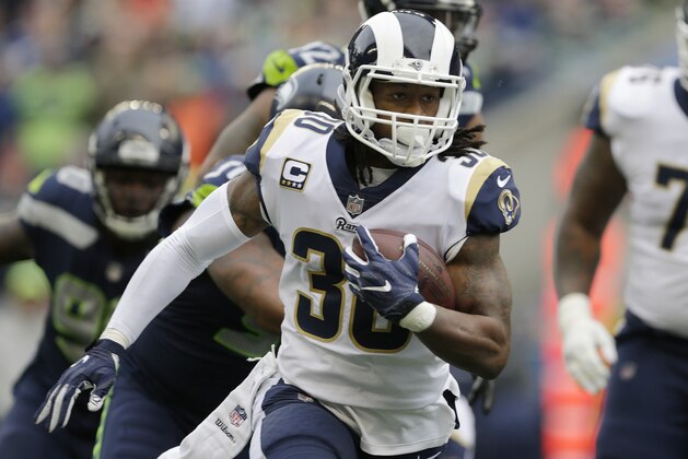 Los Angeles Rams running back Todd Gurley rushes against the Seattle Seahawks in the first half of an NFL football game, Sunday, Dec. 17, 2017, in Seattle. (AP Photo/John Froschauer)