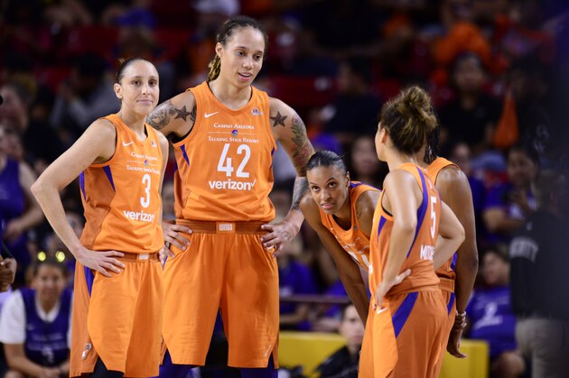 TEMPE, AZ - AUGUST 21: Diana Taurasi #3, Brittney Griner #42 and DeWanna Bonner #24 of the Phoenix Mercury look on during a huddle in Round One of the 2018 WNBA Playoffs on August 21, 2018 at Wells Fargo Arena in Tempe, Arizona. NOTE TO USER: User expressly acknowledges and agrees that, by downloading and or using this Photograph, user is consenting to the terms and conditions of the Getty Images License Agreement. Mandatory Copyright Notice: Copyright 2018 NBAE (Photo by Barry Gossage/NBAE via Getty Images)