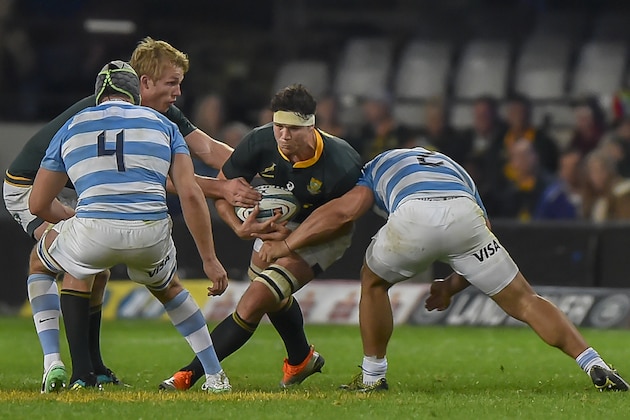 South Africa's flanker Francois Louw (C) is tackled by Argentina's hooker and captain Agustin Creevy (R) during The Rugby Championship rugby union match between South Africa and Argentina at Johnson Kings Park Stadium in Durban on August 18, 2018. (Photo by Christiaan Kotze / AFP)        (Photo credit should read CHRISTIAAN KOTZE/AFP/Getty Images)