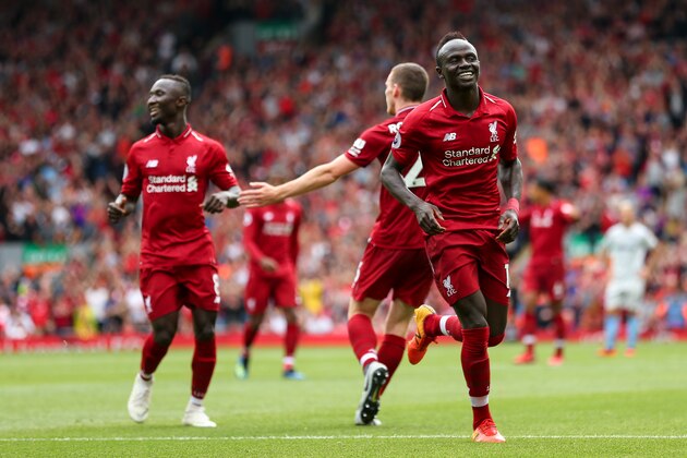 LIVERPOOL, ENGLAND - AUGUST 12: Sadio Mane of Liverpool celebrates after scoring a goal to make it 3-0 during the Premier League match between Liverpool FC and West Ham United at Anfield on August 12, 2018 in Liverpool, United Kingdom. (Photo by Robbie Jay Barratt - AMA/Getty Images)