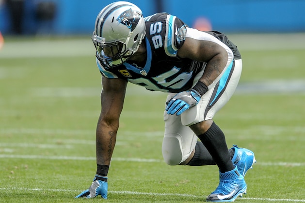Carolina Panthers defensive end Charles Johnson (95) lines up during the second half of an NFL football game against the Atlanta Falcons in Charlotte, N.C. Saturday, Dec. 24, 2016. (AP Photo/Mike McCarn)