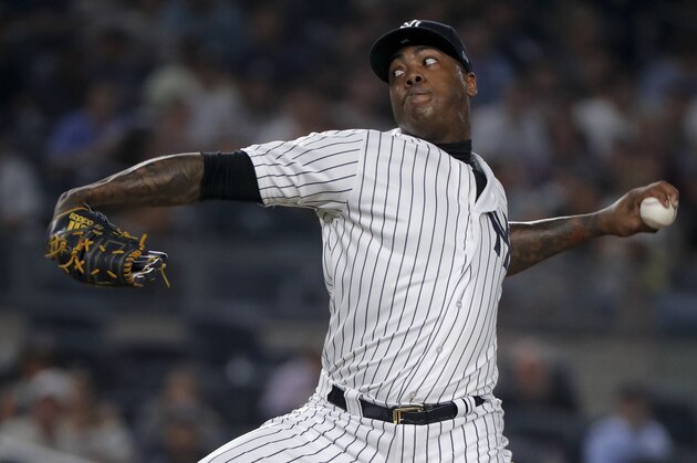 New York Yankees relief pitcher Aroldis Chapman delivers against the Texas Rangers during the ninth inning of a baseball game, Thursday, Aug. 9, 2018, in New York. (AP Photo/Julie Jacobson)