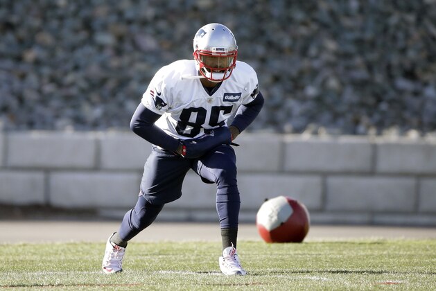 New England Patriots wide receiver Kenny Britt stretches while warming up during an NFL football practice, Wednesday, Dec. 20, 2017, in Foxborough, Mass. (AP Photo/Steven Senne)