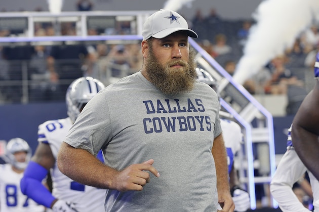 Injured Dallas Cowboys center Travis Frederick (72) runs onto the field before a preseason NFL Football game against the Cincinnati Bengals in Arlington, Texas, Saturday, Aug. 18, 2018. (AP Photo/Roger Steinman)