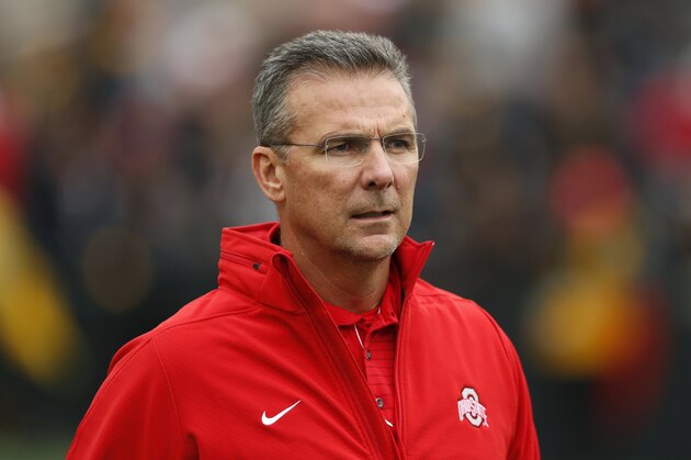FILE - In this Nov. 4, 2017, file photo, Ohio State head coach Urban Meyer walks on the field before an NCAA college football game against Iowa, in Iowa City, Iowa. Ohio State trustees are set to discuss the future of football coach Urban Meyer. The 20-member board plans to meet in private on Wednesday morning, Aug. 22, 2018, in Columbus to decide whether Meyer should be punished for his handling of domestic-abuse allegations against a former assistant coach.(AP Photo/Charlie Neibergall, File)