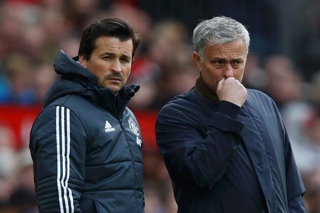 MANCHESTER, ENGLAND - APRIL 29: Jose Mourinho, Manager of Manchester United and Rui Faria, Manchester United assistant manager look on during the Premier League match between Manchester United and Arsenal at Old Trafford on April 29, 2018 in Manchester, England.  (Photo by Clive Brunskill/Getty Images)