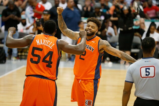 DALLAS, TX - AUGUST 17:  Andre Emmett #2 of 3's Company celebrates with teammate Jason Maxiell #54 after Maxiell made the game winning basket against the 3 Headed Monsters during week nine of the BIG3 three-on-three basketball league at the American Airlines Center on August 17, 2018 in Dallas, Texas.  (Photo by Ron Jenkins/BIG3/Getty Images)