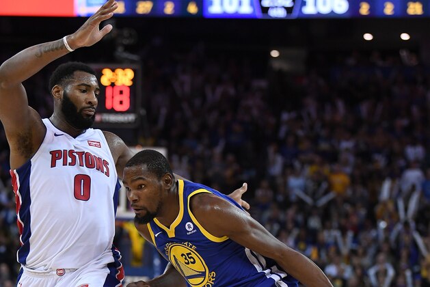 OAKLAND, CA - OCTOBER 29:  Kevin Durant #35 of the Golden State Warriors drives towards the basket on Andre Drummond #0 of the Detroit Pistons during an NBA basketball game at ORACLE Arena on October 29, 2017 in Oakland, California. NOTE TO USER: User expressly acknowledges and agrees that, by downloading and or using this photograph, User is consenting to the terms and conditions of the Getty Images License Agreement.  (Photo by Thearon W. Henderson/Getty Images)