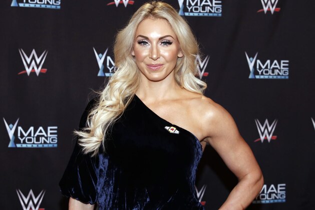 IMAGE DISTRIBUTED FOR WWE - WWE Superstar Charlotte Flair celebrates the Mae Young Classic at the Thomas & Mack Center on Tuesday, Sept. 12, 2017, in Las Vegas. (Bizuayehu Tesfaye/AP Images for WWE)