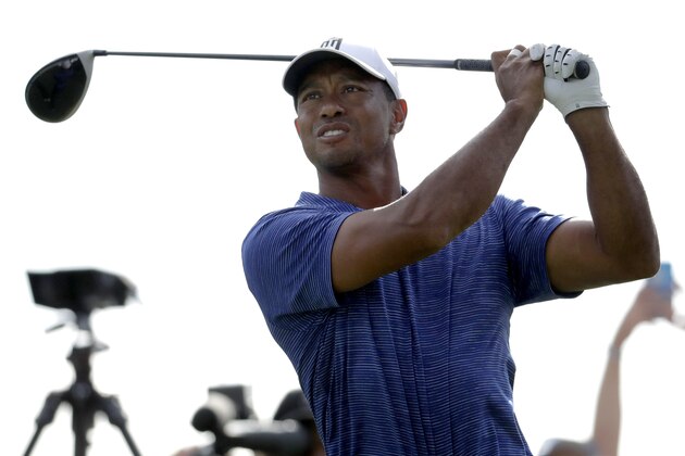 Tiger Woods tees off on the 13th hole during the first round of the Northern Trust golf tournament, Thursday, Aug. 23, 2018, in Paramus, N.J. (AP Photo/Julio Cortez)