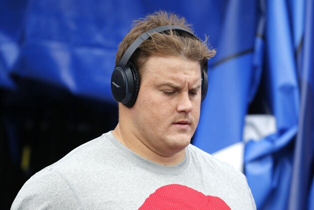 FILE - In this Sept. 13, 2015, file photo, Buffalo Bills center Richie Incognito walks to the field for warm ups before an NFL football game against the Indianapolis Colts in Orchard Park, N.Y. Though attempting to put the past behind, Bills guard Richie Incognito realizes there will be no escaping the spotlight as Buffalo prepares to face the Miami Dolphins, his former team, on Sunday, Sept. 27. (AP Photo/Bill Wippert, File)