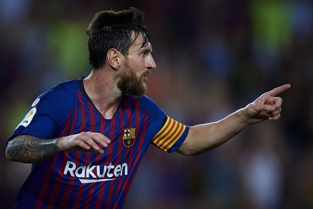 BARCELONA, SPAIN - AUGUST 18:  Lionel Messi of Barcelona celebrates after scoring the third goal during the La Liga match between FC Barcelona and Deportivo Alaves at Camp Nou on August 18, 2018 in Barcelona, Spain.  (Photo by Quality Sport Images/Getty Images)