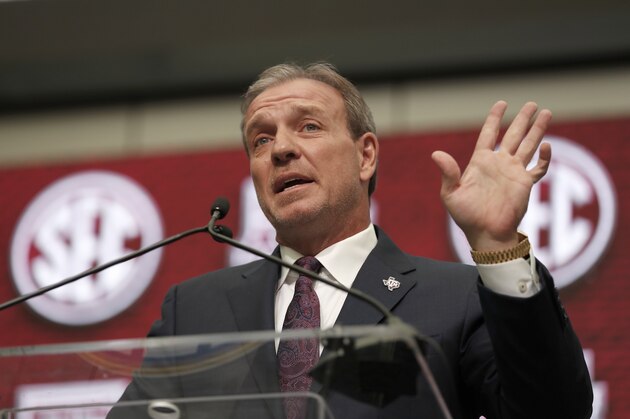 FILE - In this July 16, 2018, file photo, Texas A&M head coach Jimbo Fisher speaks at Southeastern Conference Media Days in Atlanta. Texas A&M handed Fisher a 10-year, $75 million contract to leave Florida State after Kevin Sumlin was fired last year. Aggie fans believe that's 75 million reasons why he should be the one to deliver their first national title since 1939. He knew what the expectations were before the ink was dry on the deal. And he insists he isn't daunted by them.(AP Photo/John Bazemore)