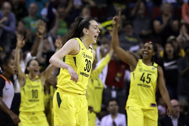 FILE - In this June 15, 2018, file photo, Seattle Storm's Breanna Stewart (30) celebrates a score against the Connecticut Sun in the second half of a WNBA basketball game, in Seattle. The WNBA season is nearing its midway point and it’s probably no surprise that Phoenix, Los Angeles and Seattle are at the top of the standings.  (AP Photo/Elaine Thompson, File)