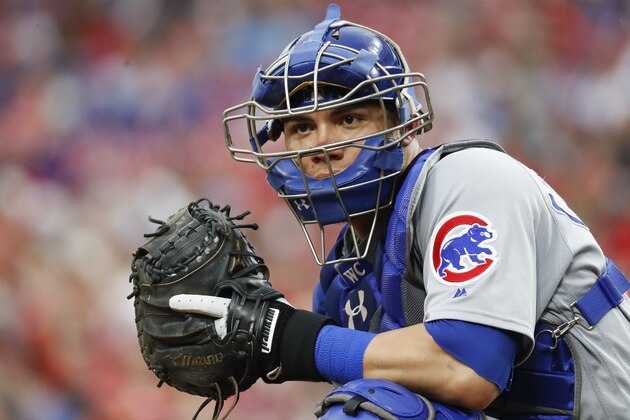 Chicago Cubs catcher Willson Contreras looks onto the dugout in the fifth inning of a baseball game against the Cincinnati Reds, Thursday, June 21, 2018, in Cincinnati. (AP Photo/John Minchillo)