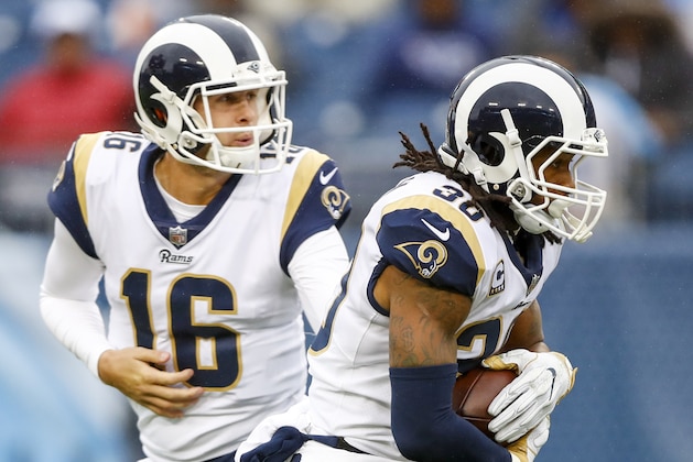 NASHVILLE, TN - DECEMBER 24: Quarterback Jared Goff  #16 hands to the ball to Running Back Todd Gurley II  #30 of the Los Angeles Rams in a game against the Tennessee Titans at Nissan Stadium on December 24, 2017 in Nashville, Tennessee. (Photo by Wesley Hitt/Getty Images)