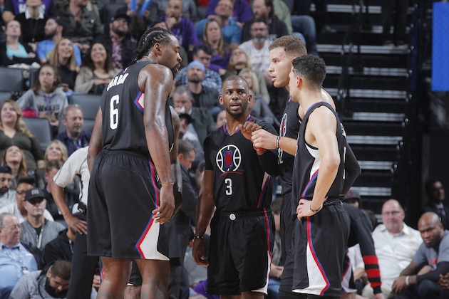 SACRAMENTO, CA - NOVEMBER 18: DeAndre Jordan #6, Chris Paul #3, Blake Griffin #32 and J.J. Redick #4 of the Los Angeles Clippers huddle during the game against the Sacramento Kings on November 18, 2016 at Golden 1 Center in Sacramento, California. NOTE TO USER: User expressly acknowledges and agrees that, by downloading and or using this photograph, User is consenting to the terms and conditions of the Getty Images Agreement. Mandatory Copyright Notice: Copyright 2016 NBAE (Photo by Rocky Widner/NBAE via Getty Images)