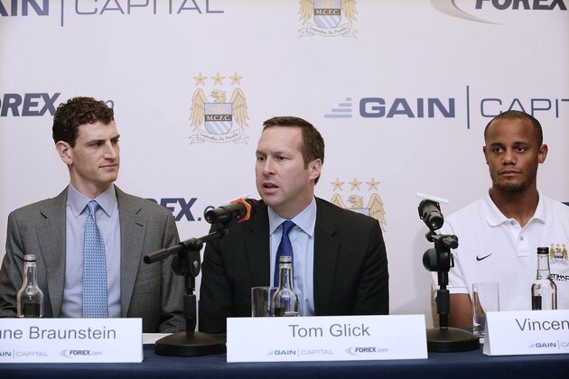 HONG KONG - JULY 26:( L to R) Gain Capital Regional Director Shane Braunstein, Manchester City's Operational Officer, Tom Glick and  Manchester City's Captain Vincent Kompany during a Manchester City Sponsorship launch with Gain Capital at the JW Marriot on July 26, 2013 in Hong Kong, Hong Kong.  (Photo by Jessica Hromas/Getty Images)