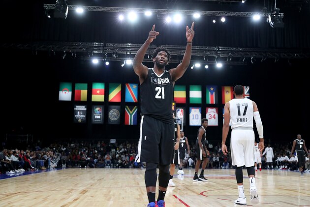 PRETORIA, SOUTH AFRICA - AUGUST 4: Joel Embiid #21 of Team Africa reacts during the game against Team World during the 2018 NBA Africa Game as part of the Basketball Without Borders Africa on August 4, 2018 at the Time Square Sun Arena in Pretoria, South Africa. NOTE TO USER: User expressly acknowledges and agrees that, by downloading and or using this photograph, User is consenting to the terms and conditions of the Getty Images License Agreement. Mandatory Copyright Notice: Copyright 2017 NBAE (Photo by Joe Murphy/NBAE via Getty Images)