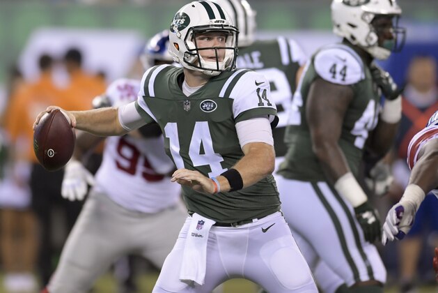 New York Jets quarterback Sam Darnold (14) steps back to throw against the New York Giants during the second quarter of an NFL football game, Friday, Aug. 24, 2018, in East Rutherford, N.J. (AP Photo/Bill Kostroun)