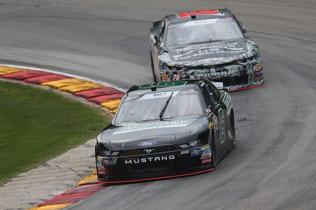 ELKHART LAKE, WI - AUGUST 24:  Conor Daly, driver of the #6 Roush Fenway Racing Ford, and Spencer Boyd  driver of the #76 Grunt Style Chevrolet, practice for the NASCAR Xfinity Series Johnsonville 180 at Road America on August 24, 2018 in Elkhart Lake, Wisconsin.  (Photo by Matt Sullivan/Getty Images)