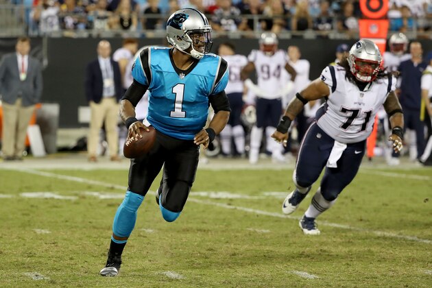 CHARLOTTE, NC - AUGUST 24:  Cam Newton #1 of the Carolina Panthers runs the ball against the New England Patriots in the second quarter during their game at Bank of America Stadium on August 24, 2018 in Charlotte, North Carolina.  (Photo by Streeter Lecka/Getty Images)