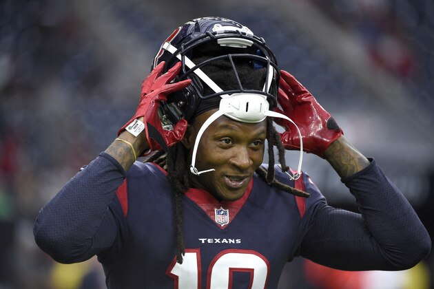 Houston Texans' DeAndre Hopkins (10) warms up before a preseason NFL football game against the San Francisco 49ers Saturday, Aug. 18, 2018, in Houston. (AP Photo/Eric Christian Smith)