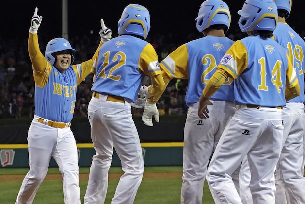 Honolulu's Sean Yamaguchi, left, is greeted by teammates after hitting a grand slam off Staten Island (N.Y.)'s Chris Bedford during the second inning of a baseball game at the Little League World Series in South Williamsport, Pa., Wednesday, Aug. 22, 2018. Hawaii won 10-0 in five innings. (AP Photo/Gene J. Puskar) Honolulu's Sean Yamaguchi, left, is greeted by teammates after hitting a grand slam off Staten Island (N.Y.)'s Chris Bedford during the second inning of a baseball game at the Little League World Series in South Williamsport, Pa., Wednesday, Aug. 22, 2018. Hawaii won 10-0 in five innings. (AP Photo/Gene J. Puskar)