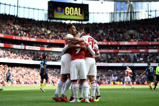 LONDON, ENGLAND - AUGUST 25: Arsenal players celebrate their team's second goal, an own goal scored by Issa Diop of West Ham United (not pictured) during the Premier League match between Arsenal FC and West Ham United at Emirates Stadium on August 25, 2018 in London, United Kingdom. (Photo by Clive Mason/Getty Images) LONDON, ENGLAND - AUGUST 25: Arsenal players celebrate their team's second goal, an own goal scored by Issa Diop of West Ham United (not pictured) during the Premier League match between Arsenal FC and West Ham United at Emirates Stadium on August 25, 2018 in London, United Kingdom. (Photo by Clive Mason/Getty Images)