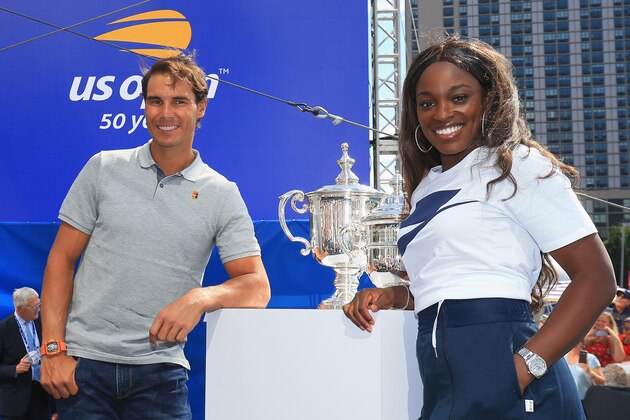 NEW YORK, NY - AUGUST 23:  (L-R) Rafael Nadal of Spain and Sloane Stephens of the United States smile alongside the US Open men's and women's singles trophies after the US Open Live Draw Unveiling at the US Open Experience at Brookfield Place on August 23, 2018 in New York City.  (Photo by Chris Trotman/Getty Images for USTA)