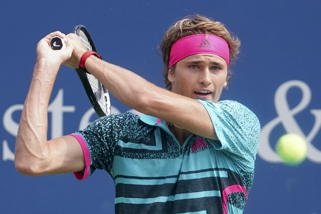 FILE - In this Aug. 15, 2018, file photo, Alexander Zverev, of Germany, returns to Robin Haase, of the Netherlands, at Western & Southern Open tennis tournament in Mason, Ohio. Zverev is the men's No. 4 seed at this year's U.S. Open, which starts Monday. (AP Photo/John Minchillo, File)