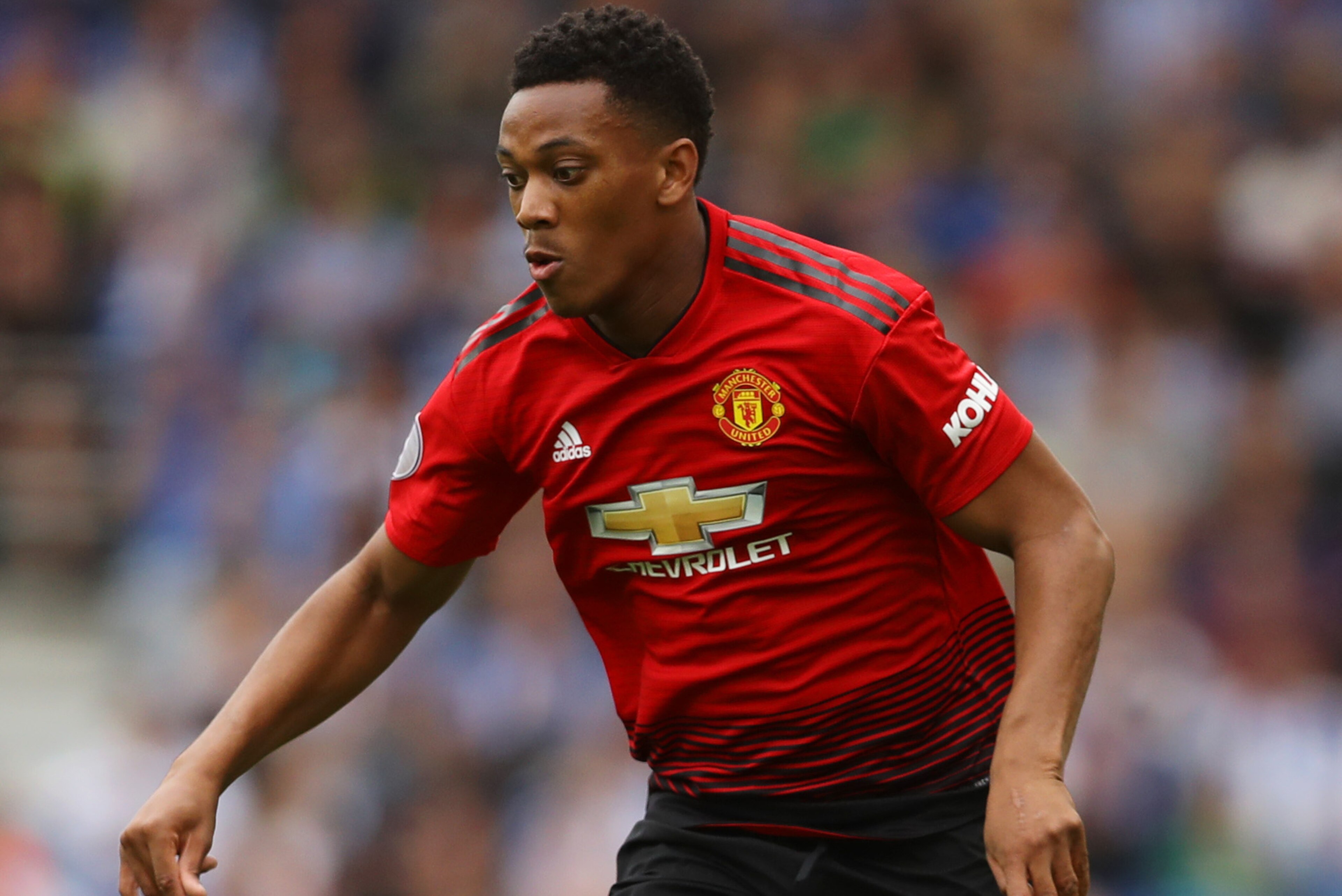 BRIGHTON, ENGLAND - AUGUST 19:  Anthony Martial of Manchester United runs with the ball during the Premier League match between Brighton & Hove Albion and Manchester United at American Express Community Stadium on August 19, 2018 in Brighton, United Kingdom.  (Photo by Dan Istitene/Getty Images)