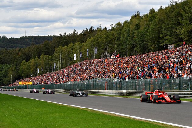 SPA, BELGIUM - AUGUST 26:  Sebastian Vettel of Germany driving the (5) Scuderia Ferrari SF71H leads Lewis Hamilton of Great Britain driving the (44) Mercedes AMG Petronas F1 Team Mercedes WO9 on track during the Formula One Grand Prix of Belgium at Circuit de Spa-Francorchamps on August 26, 2018 in Spa, Belgium.  (Photo by Dan Mullan/Getty Images)