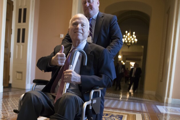 FILE - In this Dec. 1, 2017 file photo, Sen. John McCain, R-Ariz., leaves a closed-door session on Capitol Hill in Washington. A possible U.S. Senate vacancy in Arizona would be temporarily filled by a Republican appointee in the event of the death of Sen. John McCain, who is battling cancer, but it's unclear whether an election would be held in November or 2020. Arizona law requires the governor to appoint someone of the same political party if there is a vacancy. The seat will then be on the ballot for the next general election, but there's conflicting views on whether that means this fall or in 2020. (AP Photo/J. Scott Applewhite, File)