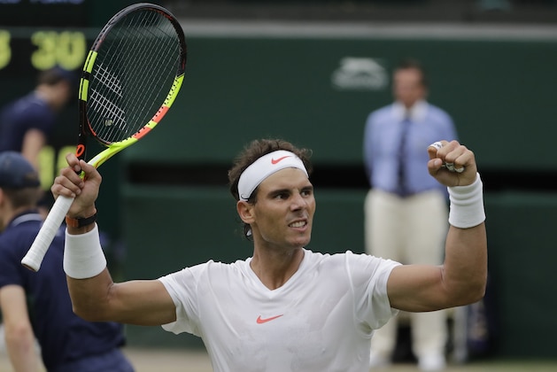 Rafael Nadal of Spain celebrates winning a point during the men's singles semifinals match against Serbia's Novak Djokovic at the Wimbledon Tennis Championships, in London, Saturday July 14, 2018.(AP Photo/Ben Curtis) Rafael Nadal of Spain celebrates winning a point during the men's singles semifinals match against Serbia's Novak Djokovic at the Wimbledon Tennis Championships, in London, Saturday July 14, 2018.(AP Photo/Ben Curtis)